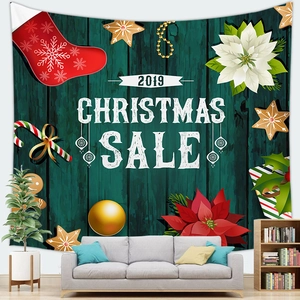 Close-up of festive Christmas tapestry with red stockings and gingerbread patterns