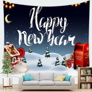 Detailed view of Santa tapestry with Happy New Year text above a cozy living room sofa