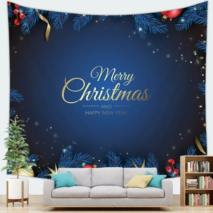 Detail of Christmas tapestry with festive gold lettering and berries in a living room