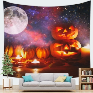 Detailed view of Halloween tapestry featuring glowing pumpkins under a full moon in a living room