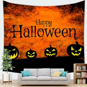 Halloween tapestry with orange pumpkins and Happy Halloween text on white wall