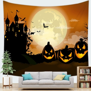 Detail of Halloween tapestry featuring pumpkin lanterns, bats and a dark castle silhouette