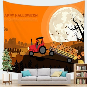 Detail of Halloween tapestry with red tractor hauling pumpkins on orange background
