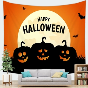 Halloween pumpkin tapestry with full moon and Happy Halloween text above a sofa
