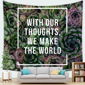 Détail de tapisserie murale avec plantes succulentes et texte décoratif en gras blanc