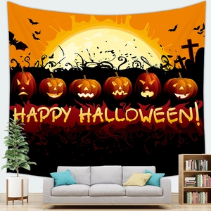 Close-up of Halloween tapestry with pumpkins, bats and Happy Halloween text on a wall