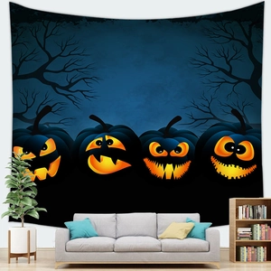 Detail of Halloween tapestry with glowing Jack-o'-lanterns hanging over a grey sofa