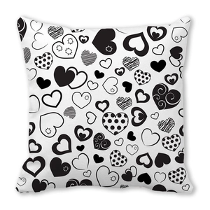 Federa per cuscino minimalista con motivi decorativi a cuore bianchi e neri fatti a mano