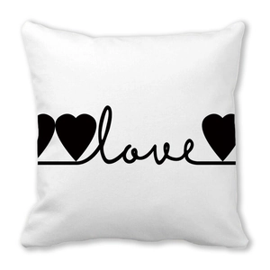 White peach skin pillowcase featuring handwritten love text and black heart patterns
