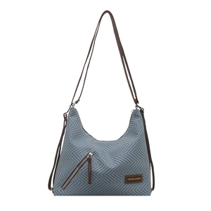 Blue and white chevron pattern straw hobo bag with brown leather strap and side zipper