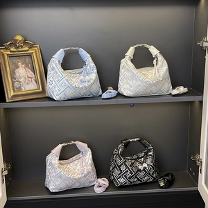 Ethnic style geometric jacquard tote bags in four colors with leather handles and tassels