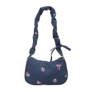 Vintage dark blue denim underarm bag with pink floral print and ruffled shoulder strap