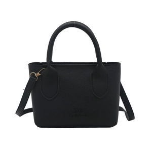 Classic black bucket bag in lychee pattern leather with golden hardware and top handles