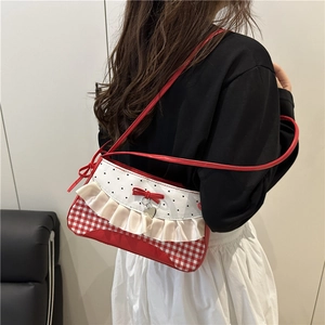 Red plaid underarm baguette bag with lace trim and heart charm detail for women