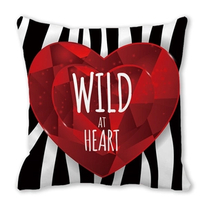 Peach skin pillowcase featuring black white stripes and a red heart with Wild at Heart text