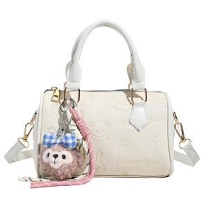 Chic beige embossed bear pattern boston bag with top handles and plush bear charm