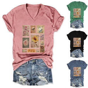 Close-up of retro stamp floral print and rolled sleeves on women V-neck T-shirt