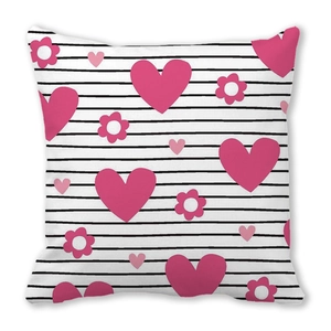 Square peach skin pillowcase with pink hearts and flowers over black white stripes