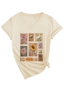 Macro shot of V-neck T-shirt detail with vintage flower stamp print and front knot hem