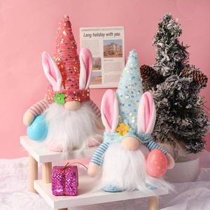 Easter Gnomes with LED lights, sequin hats and bunny ears on festive display