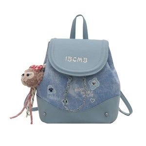 Blue denim and leather backpack with embroidery and cute teddy bear charm for women