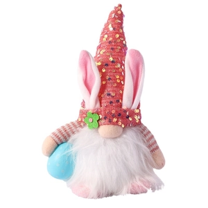 Light-up Easter gnome with pink sequin hat and rabbit ears holding a blue egg ornament