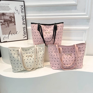 Floral textured tote bags with metal bows in off-white, light pink and rose pink colors