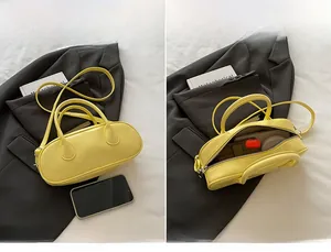 Dual view of yellow oval handbag showing exterior design and interior storage capacity