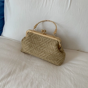 Elegant gold woven shell bag with vintage floral metal handle for women's evening fashion