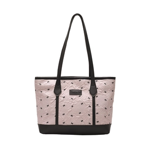 Pink pleated tote bag with black bow patterns and leather straps for casual commuting