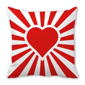 Peach skin pillowcase featuring large red heart and radiating stripes for Valentine's Day