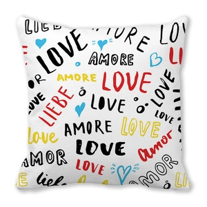 White linen pillowcase with colorful multilingual 'LOVE' hand-drawn doodle lettering