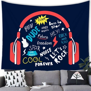 Graffiti rock music wall tapestry with headphones and guitar silhouette above a grey sofa