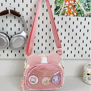 Cute white canvas rabbit crossbody bag with pink star pattern and 3 cartoon badges
