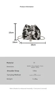Detail showing cow print bucket bag specs, 16x15x10cm size and chain strap details