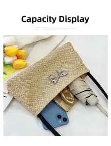 Interior view of beige woven bucket bag showing large capacity for umbrella and phone
