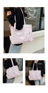 Detailed view of pink plaid tote bag featuring gold star prints and side pockets