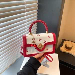 Cute cherry print square handbag with twist handle and floral clasp for women