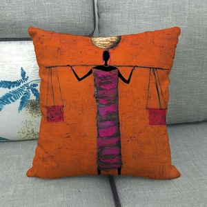 Detail of African ethnic style woman silhouette print on orange linen cushion cover