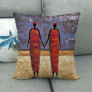 African ethnic oil painting style cushion cover featuring vibrant robes on a grey sofa