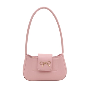 Pink minimalist shoulder bag with gold bow design and matte leather finish for women