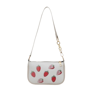 White shoulder bag with strawberry print and gold metal chain strap for women