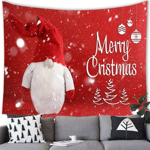 Cozy living room scene with Christmas gnome tapestry hanging above a modern sofa