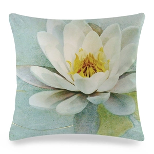 Detail of faux silk pillow cover featuring a white watercolor camellia and water lily