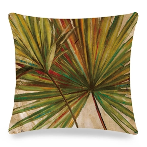 Vue détaillée d'une housse de coussin en toile avec peinture à l'huile de palmier tropical
