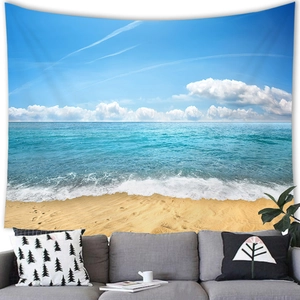 Detail showing the vibrant beach landscape tapestry hanging above a sofa in a living room