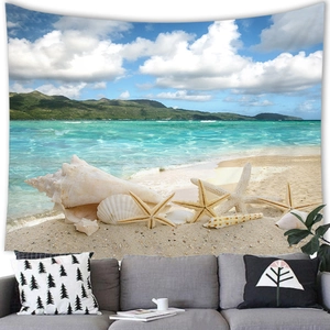 Detail of beach tapestry featuring sea shells and turquoise ocean above a sofa