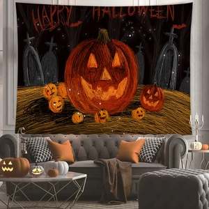 Detailed view of Halloween pumpkin tapestry hanging over a sofa in a festive living room