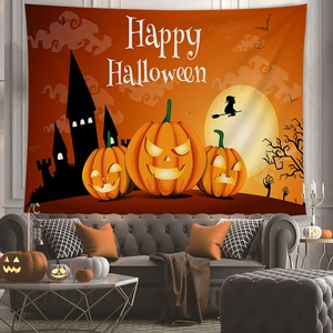 Detail of Happy Halloween tapestry with glowing pumpkins and moon over a sofa