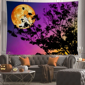 Halloween wall tapestry featuring a giant moon and dead wood over a cozy sofa decor